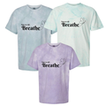 Three t-shirts with 'Note to self: Breathe' text on a white background